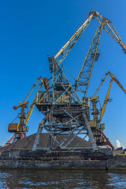 KALININGRAD, RUSSIA - 19.08.2020: Port cranes in summer day. Trade seaport - Фото, изображение