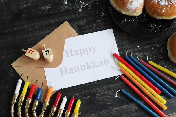 Jewish holiday Hanukkah and its famous nine-branched menorah - Foto, Imagen