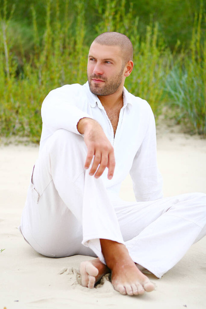 attractive and happy man on the beach - Photo, Image