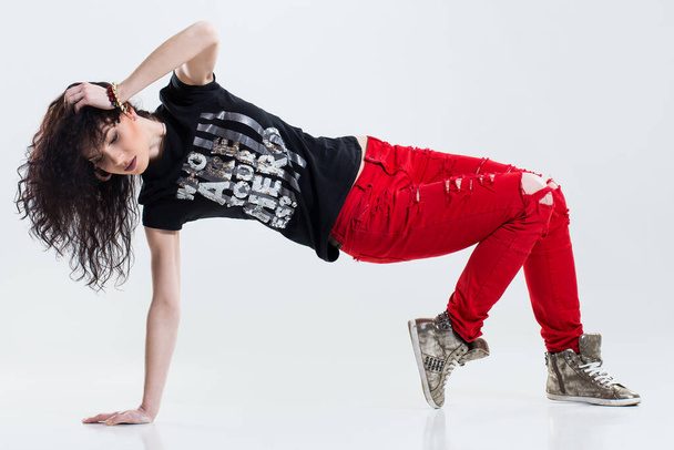 Хіп-хоп танцівниця на білому тлі
 - Фото, зображення