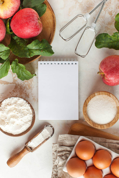 Autumn Apple pie. Ingredients for Apple pie, Charlotte and an empty Notepad for writing a text, recipe. Copy space. High quality photo - Φωτογραφία, εικόνα