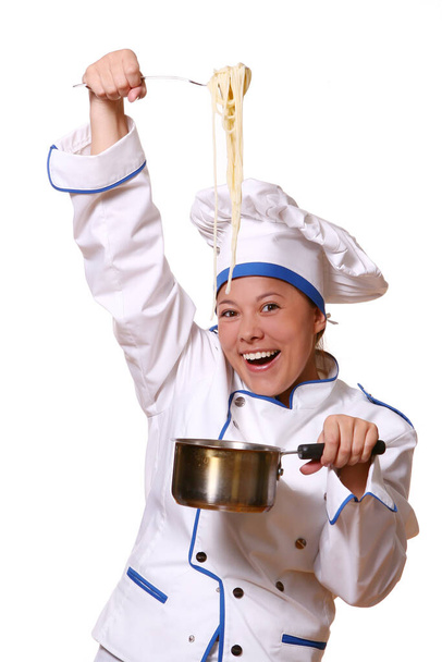 youg en mooie chef-kok met glimlach - Foto, afbeelding