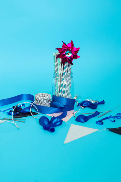Festive. Party objects on a blue background - Photo, Image