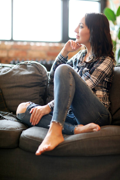 Lifestyle. Beautiful woman at home - 写真・画像