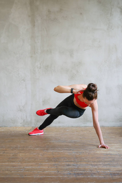 Fitness. Woman doing workout at home - Fotoğraf, Görsel