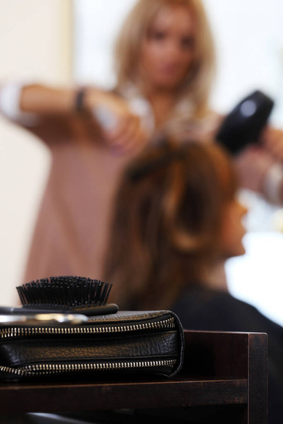 Hairdresser salon. Woman during haircut - Photo, Image