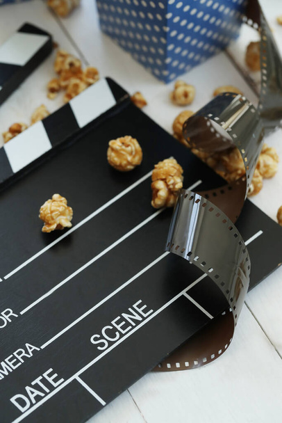 Entertainment. Delicious popcorn in cinema - Photo, Image