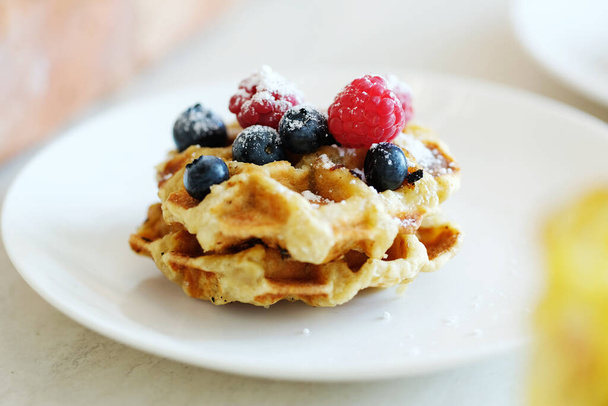 Delicious waffles on the table - Foto, imagen