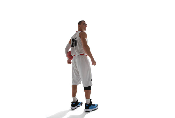 Basketball player isolated on white. - Foto, afbeelding