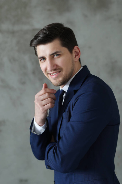 Young businessman in blue suit - Fotografie, Obrázek