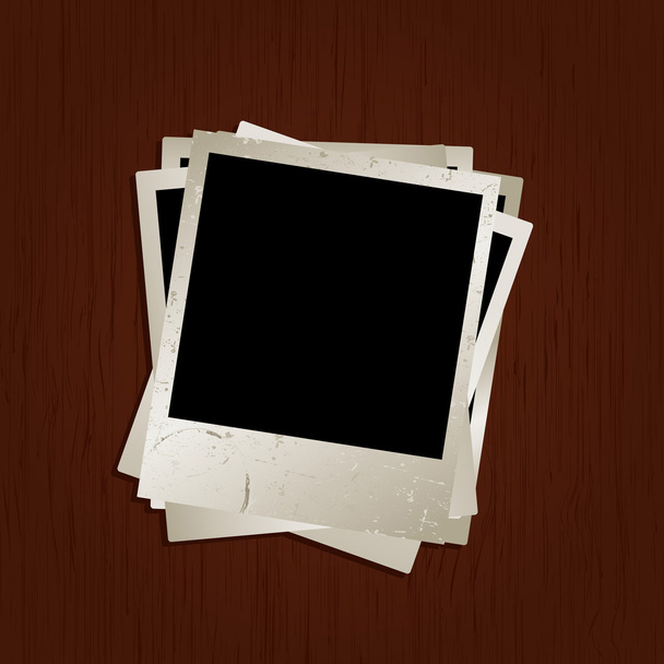 Blank photos on wooden background - Vector, Image