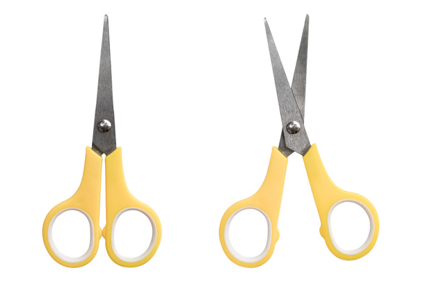 Yellow scissors of plastic handles, Isolated on white background. Object with clipping path. - Photo, Image