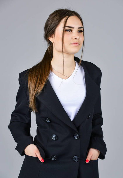Girl wear black formal suit business outfit, back to school concept - Foto, Imagem