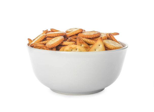Delicious crackers in bowl isolated on white - Valokuva, kuva