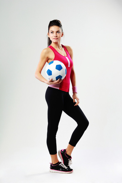 Woman with soccer ball - Фото, изображение