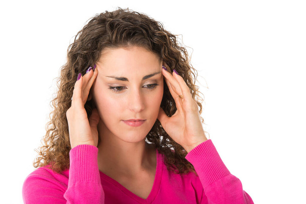 jonge vrouw heeft hoofdpijn - Foto, afbeelding
