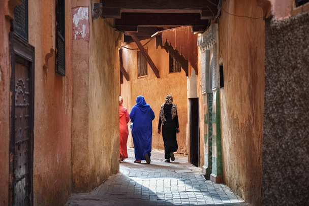 Unknown locals women in Meknes medina. Meknes is one of the four Imperial cities of Morocco and the sixth largest city by population in the kingdom. - Zdjęcie, obraz