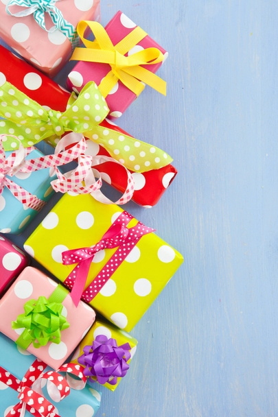 Colorful gift boxes wrapped in dotted paper - Foto, immagini