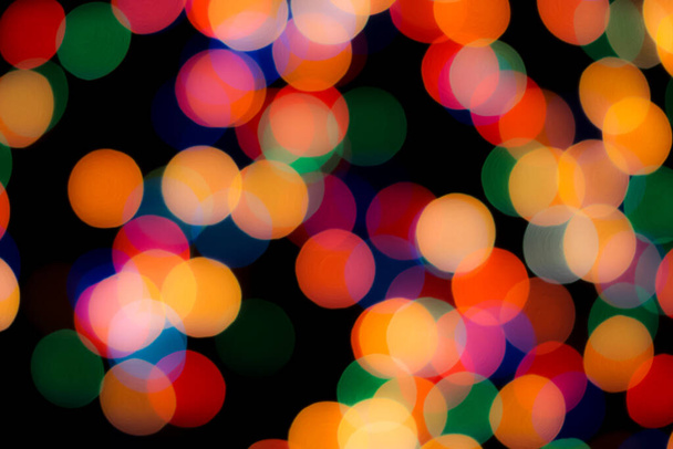 Absztrakt színes disszidált körkörös facula. Bokeh elmosódott színű fény használhatja háttér. új év bokeh defocus - Fotó, kép