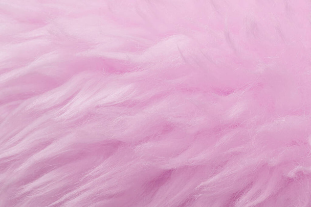 Růžová zvířecí vlna textury pozadí. Růžový odstín přírodní vlny. Detailní textura plyšové chlupaté kožešiny - Fotografie, Obrázek