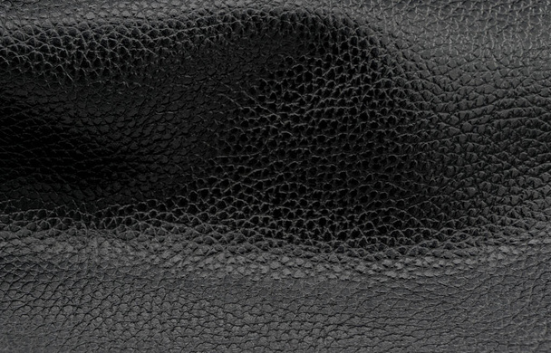Textura de cuero natural negro macro. Material oscuro con un patrón, fondo de pantalla - Foto, Imagen