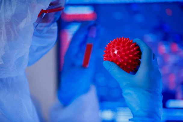 Nurse biohazard holding blood test positive Coronavirus in health lab - Foto, Imagen