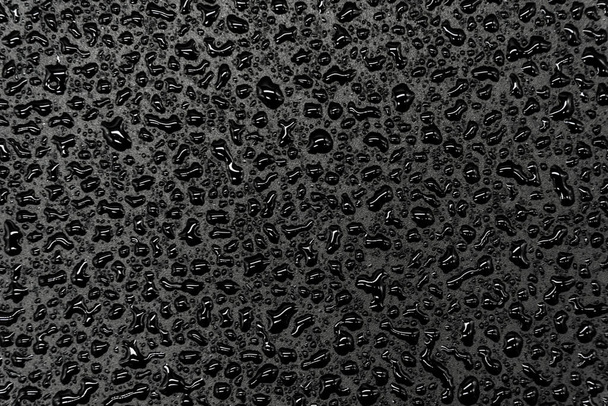 Water drops on a black background, closeup texture - Photo, Image