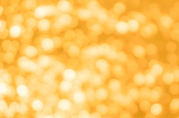Yellow bokeh background texture. Golden blurred bright glare of light texture - Fotoğraf, Görsel