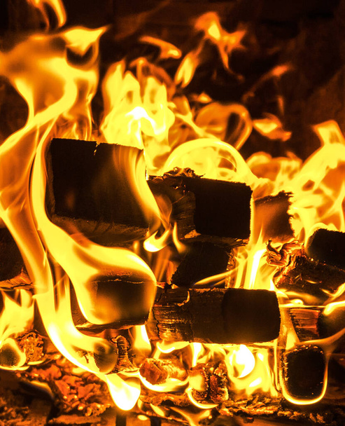 Burning firewood in the fireplace, stove, macro - Photo, Image