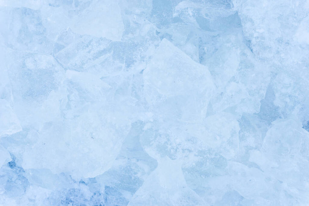 crushed pieces of ice with snow background texture - Foto, imagen