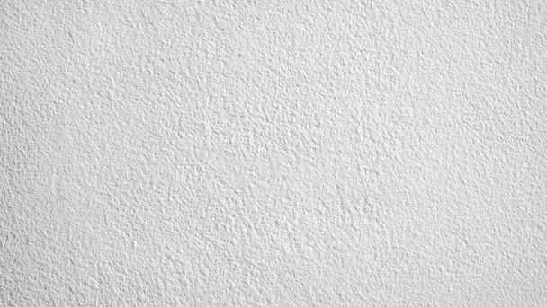 White seamless concrete wall texture background, cement wall with a small relief, plaster texture, for designers, white seamless background - Foto, imagen