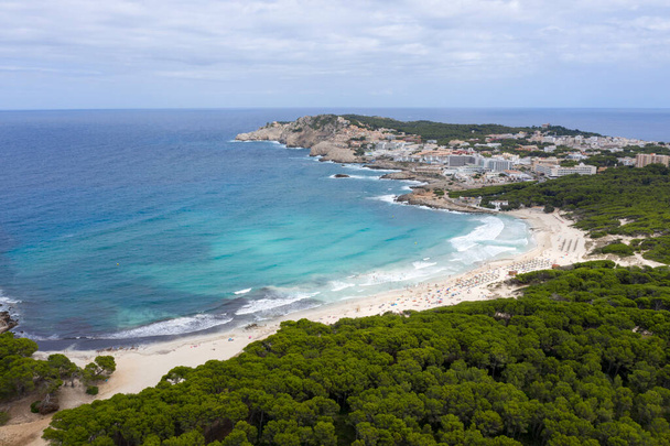 aerial view of people swimming in the Bay of Cala Agulla Majorca Spain - Foto, imagen