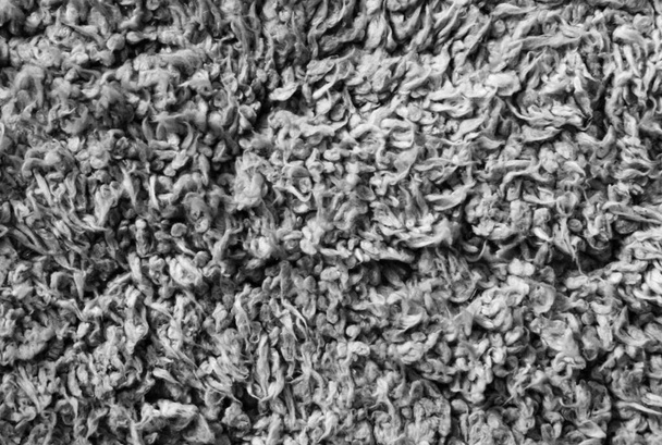 laine grise noire fond de texture, laine de coton, polaire blanche, laine de mouton naturelle foncée, texture de fourrure duveteuse noire, tapis gris, macro, gros plan laine grise avec détail de motif tissé, laine moelleuse - Photo, image
