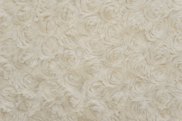 Fundo de textura de lã branca, lã de algodão, lã de ovelha natural branca, pele macia bege, tapete branco fragmento, lã leve close-up com detalhes do padrão tecido, material de tecido de fábrica com uma torção - Foto, Imagem