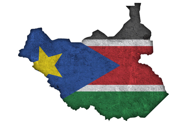 Yıpranmış beton üzerinde Güney Sudan haritası ve bayrağı - Fotoğraf, Görsel