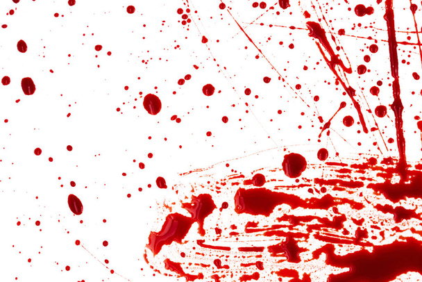 Sanguinosi spruzzi e gocce su uno sfondo bianco. Gocciolamento e seguente sangue rosso (vernice) - Foto, immagini