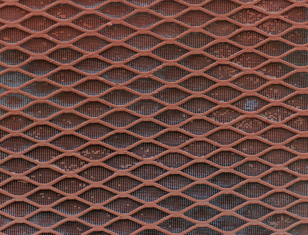 A detailed closeup of an iron mesh - Foto, Imagen