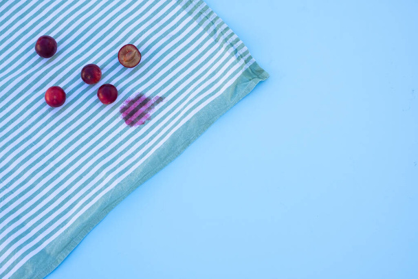 dirty stains on the tablecloth. isolated on blue table.top view. High quality photo - Fotó, kép