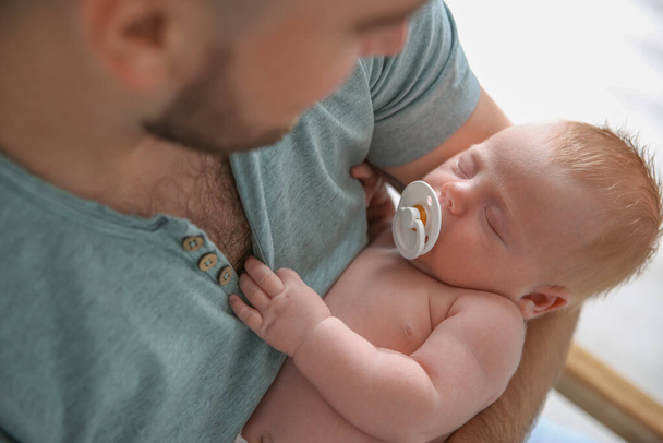 Father with his newborn son, closeup view - Foto, Imagen