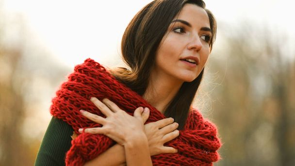 young girl in a red scarf. High quality photo - Photo, Image