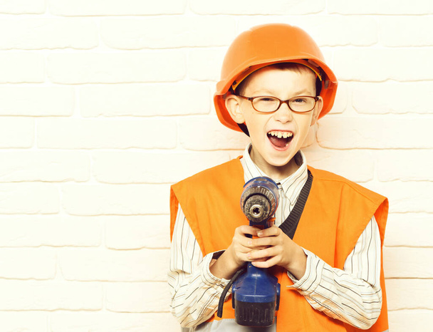 young cute builder boy - Valokuva, kuva
