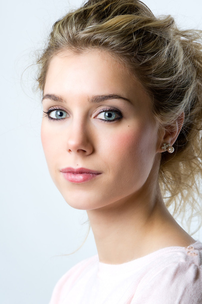 Beautiful young blonde woman looking at the camera - Fotografie, Obrázek