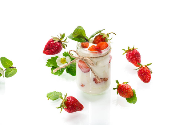 sweet homemade yogurt with ripe fresh strawberries in a jar - Zdjęcie, obraz