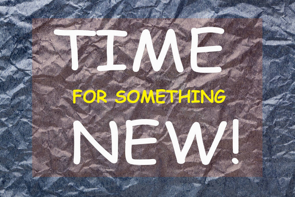 Time for something new text on wrinkled paper texture background. - Photo, Image