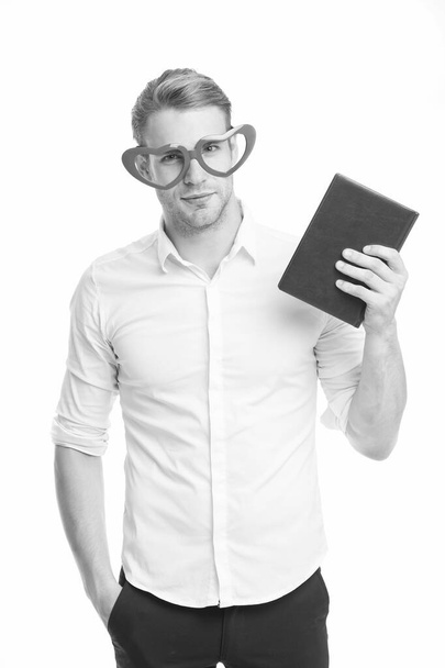 Bookworm and library concept. In love with poetry. University student with book. Romantic author. Teacher funny guy. Male student reading. Book nerd wearing cute glasses. Man with book. Study hard - Foto, afbeelding
