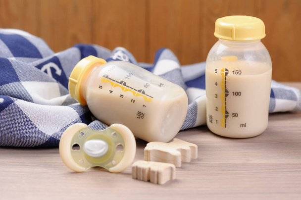 bottle of mother breast milk, breast milk storage and handling concept - Photo, Image
