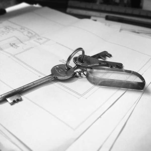 keys on architectural plan papers at work - Photo, Image