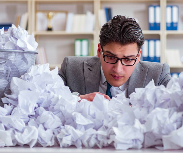 The businessman in paper recycling concept in office - Photo, image