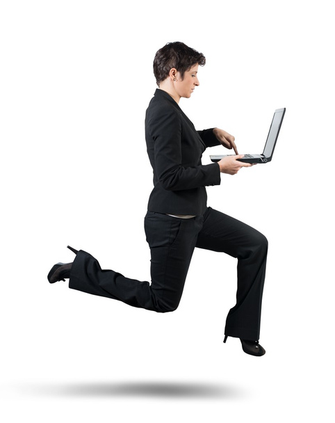 Jumping businesswoman - Foto, Bild