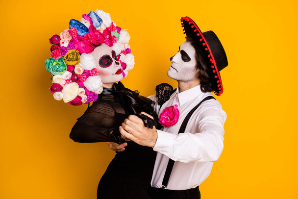 Portrait of his he her she glamorous trendy couple spending night event catrina festival dancing passionate move tango desire temptation isolated bright vivid shine vibrant yellow color background - Photo, image